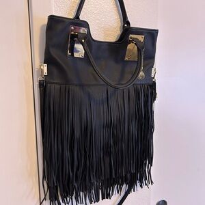 Sleek Black Leather Tote with Fringe